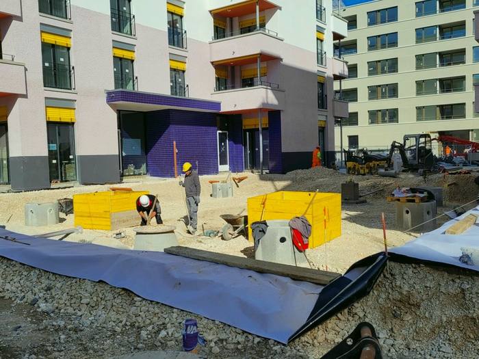 Terrassements et pose des réseaux au pied des immeubles
